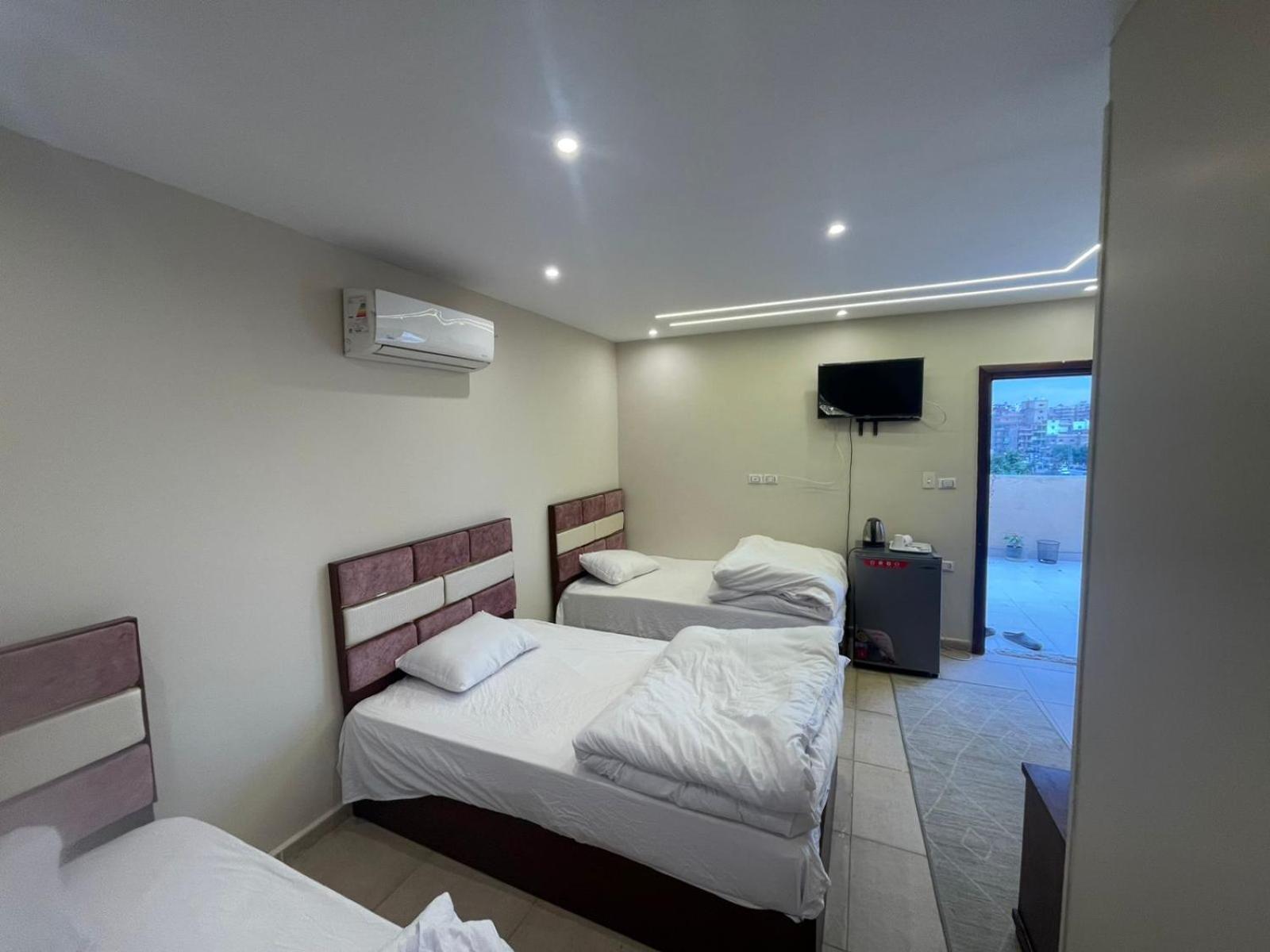 Sami Holiday Inn - Pyramids View Rooftop Al Kawm al Akhdar 外观 照片
